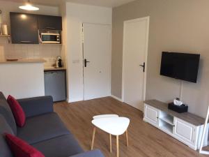 Η κουζίνα ή μικρή κουζίνα στο Appartement F2 calme et élégant