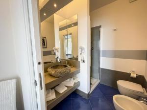 Koupelna v ubytování Albergo Da Carmine