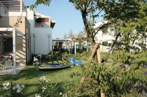 Zahrada ubytování Villaggio Laguna Blu