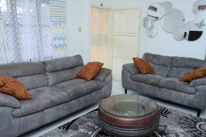 Photo de la galerie de l'établissement Mello Cozy Stand Alone Home ., à Namugongo