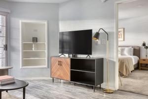 a living room with a flat screen tv on a dresser at Sherman Oaks 1BR nr WF TJ nr Ventura Blvd LAX-538 in Los Angeles