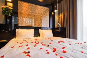 Posteľ alebo postele v izbe v ubytovaní Platinum Palace Boutique Hotel & SPA