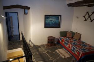 A bed or beds in a room at Casa Josefa