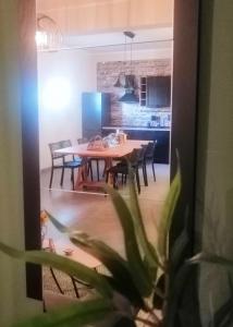 A kitchen or kitchenette at B&B DOMUS 65