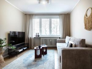 Televízia a/alebo spoločenská miestnosť v ubytovaní Apartament Good Morning Wrocław 1 piętro - Klima - 100m Rynek - Netflix - Parking w cenie