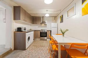 Nhà bếp/bếp nhỏ tại Flateli Poble Sec
