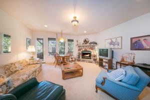 a living room with a couch and a fireplace at Annandale - V067 in Lake Arrowhead