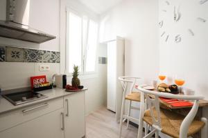 A kitchen or kitchenette at Edificio Conde 7- Plaza de la Merced