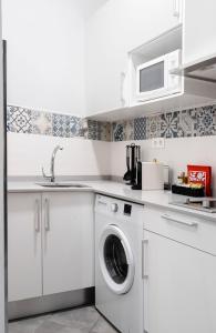 A kitchen or kitchenette at Edificio Conde 7- Plaza de la Merced