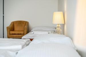Postel nebo postele na pokoji v ubytování Hotel Fontána