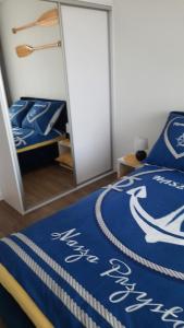 Posteľ alebo postele v izbe v ubytovaní Apartament Słońce i Plaża Kołobrzeg