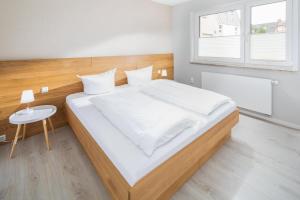 Postel nebo postele na pokoji v ubytování Inselgarten