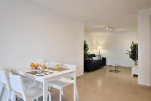 Posezení v ubytování Cosy and Modern Apartment Portu Frailis