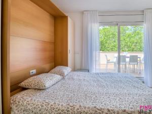 Posteľ alebo postele v izbe v ubytovaní S'agaró Centre Ap 3
