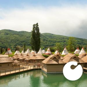 a group of buildings with roofs in the water at Pirate Bay - Terme Čatež in Čatež ob Savi