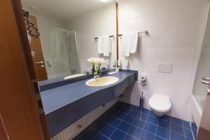 Ein Badezimmer in der Unterkunft Skycity Hotel Atrigon