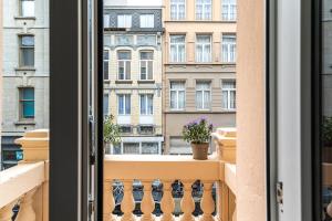 a balcony with a view of a building at Studio Anvers in Antwerp