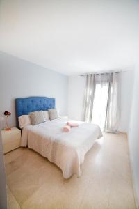 Un pat sau paturi într-o cameră la Villa el Roque