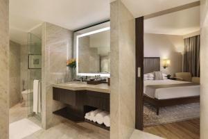 Postel nebo postele na pokoji v ubytování Hyatt Regency Delhi