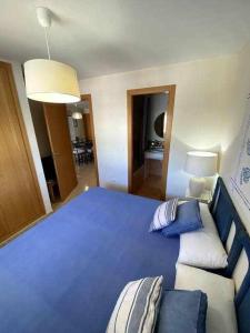 A bed or beds in a room at Directo a la playa con vistas del mar