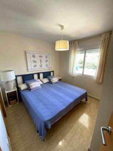 A bed or beds in a room at Directo a la playa con vistas del mar
