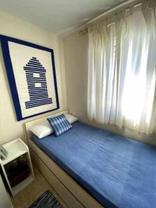A bed or beds in a room at Directo a la playa con vistas del mar