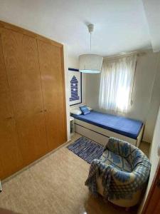 A bed or beds in a room at Directo a la playa con vistas del mar