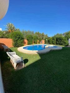 The swimming pool at or close to Directo a la playa con vistas del mar