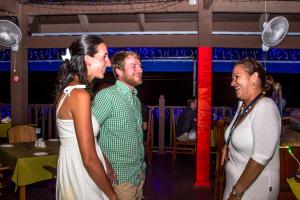 a man and woman standing next to each other on a dance floor at Treasure Cove Hotel & Restaurant in Bel Ombre +37 photos