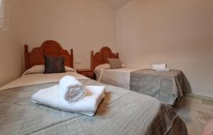 Postel nebo postele na pokoji v ubytování DS Casa en Casco-Histórico, parking opcional