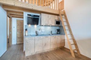 A kitchen or kitchenette at Eggerhof Familiennestl