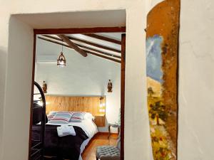 Postel nebo postele na pokoji v ubytování Quinta da Utopia