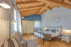 Postel nebo postele na pokoji v ubytování Villa Graziela + 32 fotografií