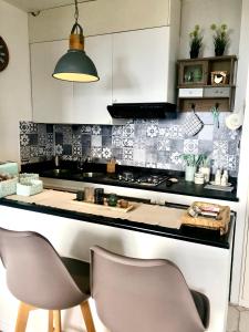 A kitchen or kitchenette at La Mansarda di San Lorenzo