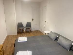 Posezení v ubytování Hostal La Taberna