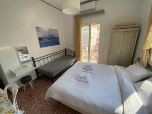 Кровать или кровати в номере Sunset view Rooms