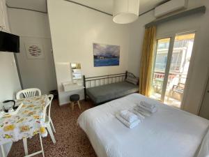Кровать или кровати в номере Sunset view Rooms