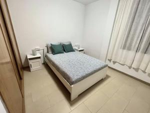 Кровать или кровати в номере Casa Azul - Piso amplio en la capital