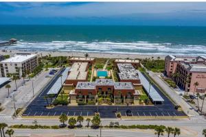 an aerial view of a resort and the beach at Condo By The Sea! in Cocoa Beach