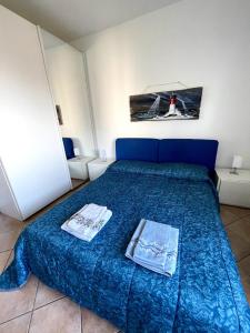 Postel nebo postele na pokoji v ubytování La casa di Lory