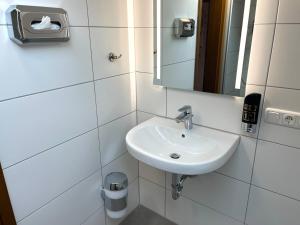 Koupelna v ubytování Gästehaus Forggensee