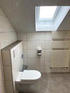 Koupelna v ubytování Gästehaus Forggensee