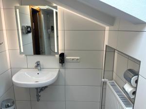 Koupelna v ubytování Gästehaus Forggensee