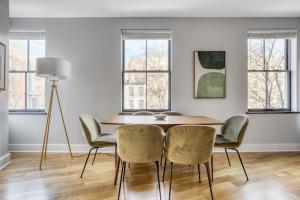 a dining room with a table and chairs at West Village 3br w wd nr Pier 46 NYC-1098 in New York