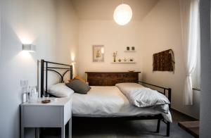 Postel nebo postele na pokoji v ubytování Domus Eura