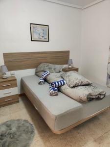 Posteľ alebo postele v izbe v ubytovaní Estrella playa