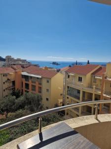 a view from a balcony of some buildings at Marta apartment in Petrovac na Moru