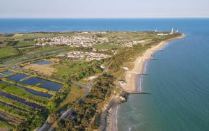 an aerial view of a beach and the ocean at Camping Les Perouses in Saint-Clément-des-Baleines