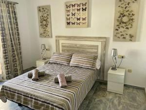 Posteľ alebo postele v izbe v ubytovaní Monte Duquesa - 4 bedroom apt, 3 bathrooms close to Port and Beach, communal pool