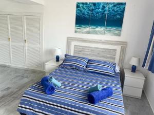Posteľ alebo postele v izbe v ubytovaní Monte Duquesa - 4 bedroom apt, 3 bathrooms close to Port and Beach, communal pool